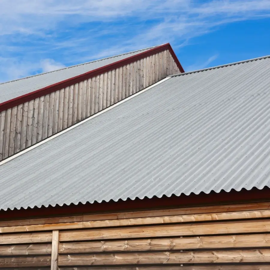 Corrugated metal roof installed on a wooden building in Muskoka Ontario