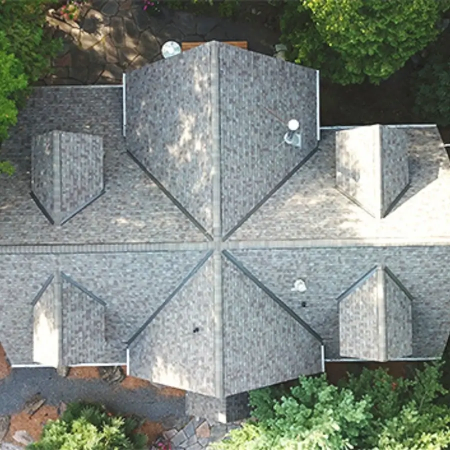 Aerial view of architectural asphalt shingle roof installed on a residential home in Muskoka
